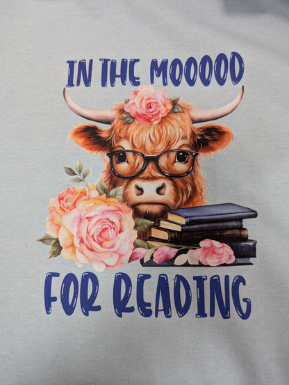 In the Mooood For Reading sweatshirt, Reading Highland Cow, unisex blue top