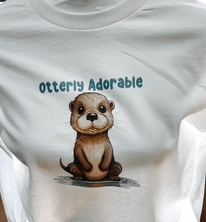 Otterly Adorable long-sleeve tshirt in white, graphic tee