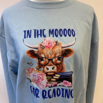In the Mooood For Reading sweatshirt, Reading Highland Cow, unisex blue top