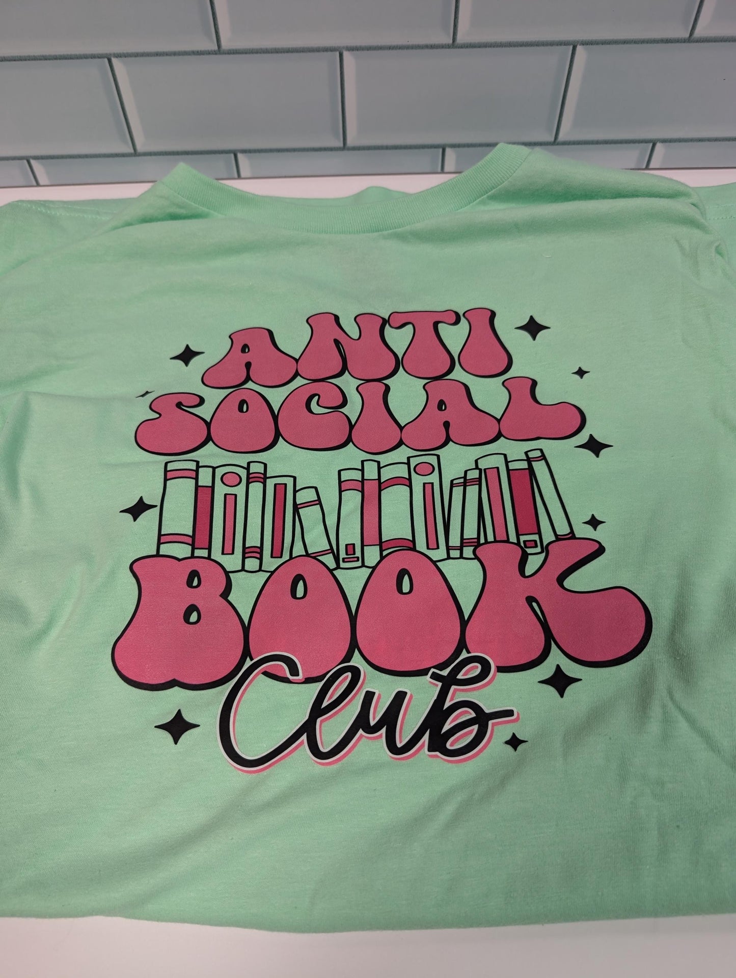 Anti Social Book Club T-Shirt, bright green colour, graphic cotton tee